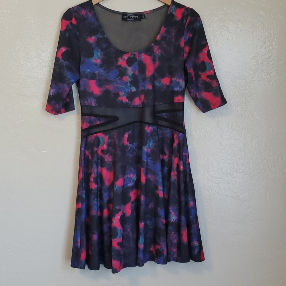 Fun mini dress with mesh inserts